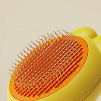 Peigne en acier inoxydable pour chiens et chats Brosse autonettoyante pour chat Toilettage de cheveux Accessoires pour animaux de compagnie pour le nettoyage et le bain