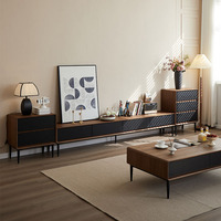 Ensemble meuble TV et table basse minimalistes modernes, pieds hauts, en noyer massif noir, style nordique luxueux, sur pieds.