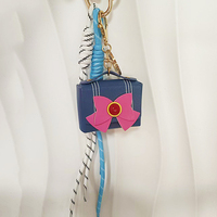 Nouveau porte-clés tendance pour femme avec nœud papillon, mini sac décoratif en PU en forme de sac, cordon de suspension populaire