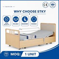 Lit médical manuel à double manivelle en bois massif avec tête de lit, pieds articulés, barrière relevable et pliable, roulettes mobiles - Offre Spéciale