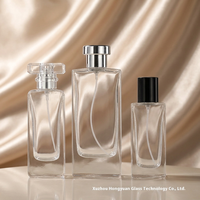 Le fabricant vend des flacons de parfum en verre de haute qualité de 30 ml, 50 ml et 100 ml avec couvercle