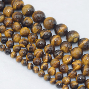 Venta al por mayor de cuentas de piedra natural de ojo de tigre de calidad 12mm - Product Image 1