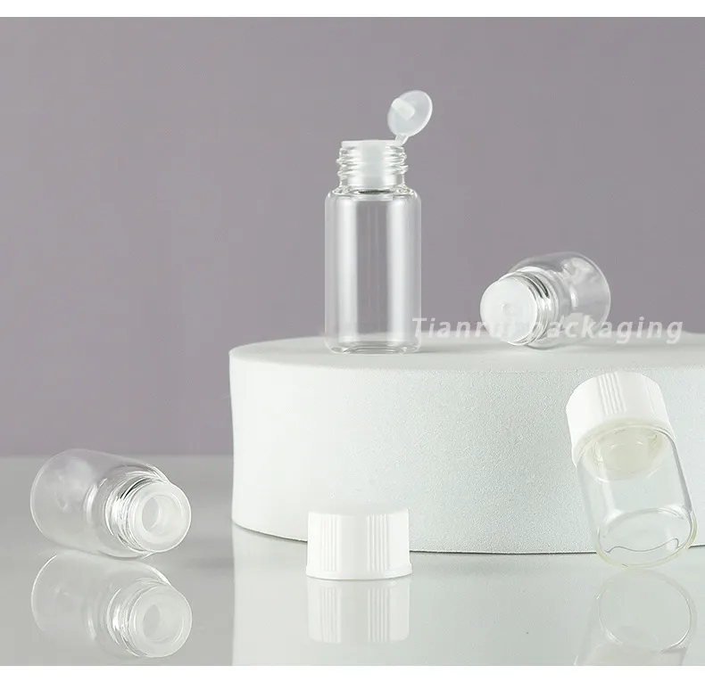 Guangzhou, 1ml, 2ml, 3ml, 5ml, vial de muestra de suero cosmético vacío para aceite esencial, Mini botella de tabletas de vidrio azul transparente con tapa