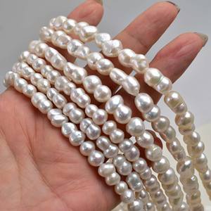 ลูกปัดมุกน้ำจืดทรงบาร็อคสีขาวธรรมชาติ รูปทรงเลข 8 ขนาด 7-11-14 มม. อุปกรณ์กึ่งสำเร็จรูป สำหรับทำสร้อยคอ - Product Image 1