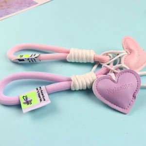 Porte-clés mignon en cuir PU avec dessin animé, mousqueton pour sac à dos d'enfant, accessoire de mode - Product Image 4
