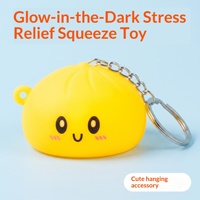Porte-clés anti-stress en silicone coloré en forme de chignon lumineux, jouet multicolore de dessin animé pour étudiants et employés de bureau