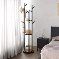 Porte-manteau sur pied moderne en fil métallique pour la maison et les salles de bain d'hôtel, idéal pour accrocher les vêtements comme un arbre