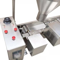 Nouvelle machine à mini-beignets automatique en acier inoxydable avec contrôle de la température pour la transformation de la farine
