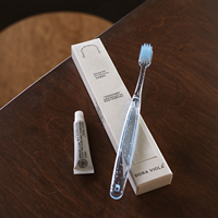 Nouveauté : Trousse dentaire jetable pour hôtel, emballée dans une boîte en papier écologique, avec brosse à dents et dentifrice