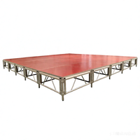 Plateforme de scène professionnelle pour DJ avec structure en aluminium, escaliers et table intégrées