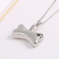 Collier urne funéraire pour animaux de compagnie en acier titane doré, motif os de chien, avec empreinte de patte, pendentif crémation ouvrable et kit de remplissage