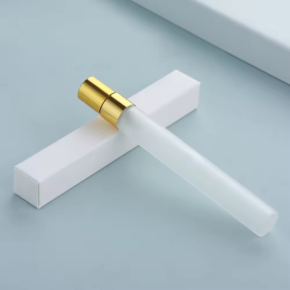 bouteille givrée + pulvérisateur doré + boîte blanche