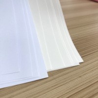 Carton couché blanc sans bois (FBB) 50-100 g/m² anti-déformation recyclable A4/A5 500 feuilles compatible impression offset pour emballage cadeau