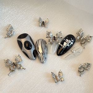 TSZS Y2K 3D farfalla <span class=keywords><strong>unghie</strong></span> parti argento <span class=keywords><strong>con</strong></span> cristallo Nail Art charm in fai da te Nail Art accessori per la decorazione - Product Image 1