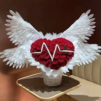 Vente en gros de bouquets de plumes électriques en forme d'ailes d'ange, matériel pour arrangements floraux, emballage en soie imprimée, commandes personnalisées acceptées