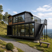 Maison mobile en acier personnalisable avec balcon vitré et escalier extérieur