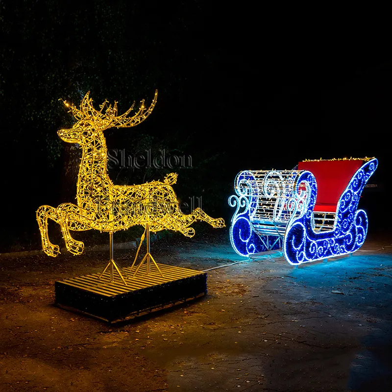 Trineo de Papá Noel de tamaño real, luz cálida, decoración de renos