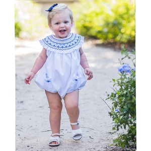 สาวปาร์ตี้ฤดูร้อนเบ็ตตี้สีฟ้า Smocked ฟองกับกระเป๋า - Product Image 1