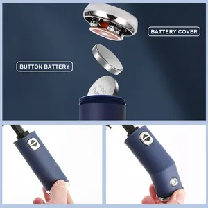 Linterna LED repelente al agua logotipo personalizado barato totalmente automático a prueba de viento tres paraguas plegable para la noche