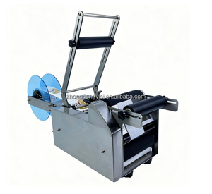 Machine d'étiquetage semi-automatique pour bouteilles rondes - Utilisée pour l'étiquetage des canettes de boissons et des confitures avec des étiquettes autocollantes - Product Image 1