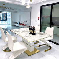 Ensemble de table à manger extensible moderne en acier inoxydable et pierre avec 6 à 8 chaises en cuir blanc pour hôtel, appartement, villa
