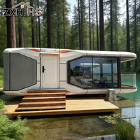 Pods de glamping de luxe avec fenêtre en verre et intérieur de cabane haut de gamme pour l'hébergement en capsule dans les complexes hôteliers de plage