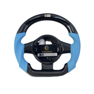Volant personnalisé CCExcellent en cuir perforé bleu avec écran LDE et inserts en fibre de carbone - Product Image 1