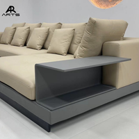 Canapé sectionnel minimaliste italien avec table d'appoint en métal Meubles de salon pour maison moderne Canapé en cuir rembourré en forme de L