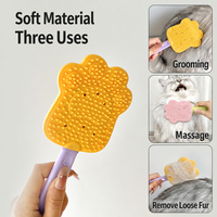 Peigne de massage portable en silicone pour animaux de compagnie, design patte de chat, autonettoyant, outil doux de toilettage et de démêlage pour chats et chiens, pour le bain à domicile