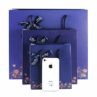 Sacs cadeaux en carton laminé mat de luxe, motif floral, impression de logo personnalisé, résistants à l'humidité, imperméables, avec poignées à cordon, ruban
