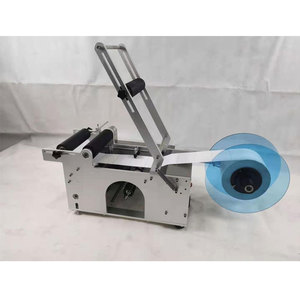 Machine d'étiquetage semi-automatique MT50 pour bouteilles rondes avec codeur pour bocaux en verre, flacons et boîtes de conserve - Product Image 5