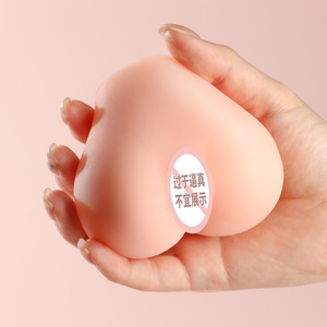 เครื่องช่วยสำเร็จความใคร่ชายแบบสองช่องทาง รูปทรงลูกพีช - ของเล่นผู้ใหญ่ - Product Image 1