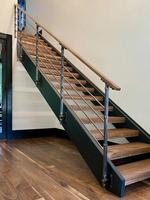 Escalier à poutres en acier au carbone sur mesure de style moderne Prima Factory pour maison et villa contemporaines