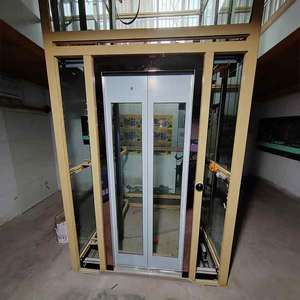 Ascensor Residencial de Lujo en Acero Inoxidable Dorado con Cabina Espejada Grabada para Propiedades de Alta Gama - Product Image 1