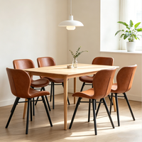 Chaise rétro en PU à prix d'usine avec dossier cintrée à surpiqûres contrastées et pieds en métal noir robustes pour bistrot et cuisine (vente en gros)