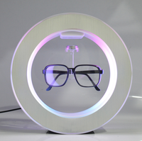 2024 vendeur chaud blanc flottant lévitation magnétique rotatif lévitation lunettes flottation stand lunettes affichage