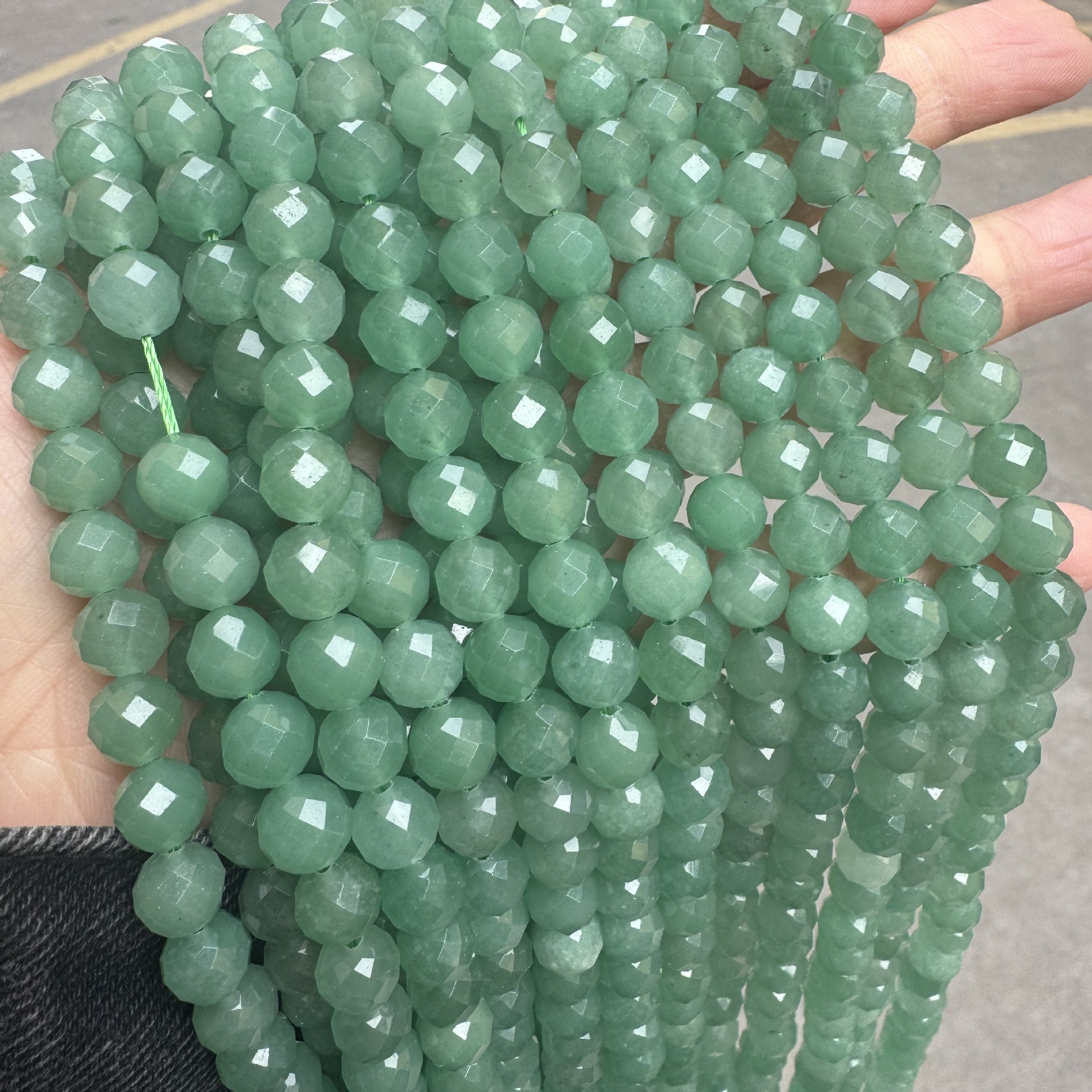 Faceted green aventurine bead