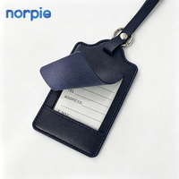 Étiquette de bagage en cuir PU bleu foncé avec rabat gravé au laser pour visites de parcs à thème, support de nom pour bagages, stock mixte