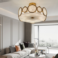 Plafonnier moderne à deux niveaux circulaire en albâtre naturel |   Lustre LED en laiton doré pour salon et villa