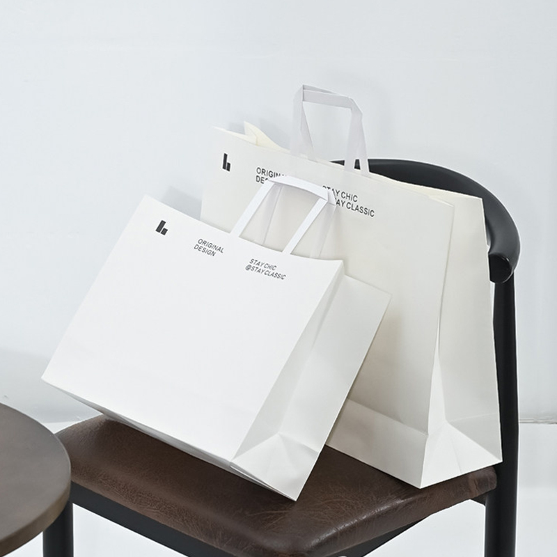 Kraft Paper Bags Handheld Clothing Gift Packaging Bags Wholesale High-end Clothing Store Tote Bags Custom LOGO