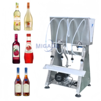 Machines de remplissage semi-automatiques à 4 têtes par gravité pour bouteilles d'eau avec pompe d'alimentation, machines de remplissage de vin liquide