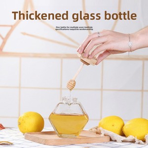 ขวดน้ำผึ้งแก้วใสทรงหกเหลี่ยมสูงสีขาวพร้อมฝาไม้ไผ่พร้อมแท่งคนผสม ดีไซน์ป้องกันการรั่วซึม ขนาด 380 มล. - Product Image 4