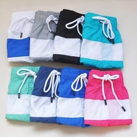 Shorts de bain décontractés pour hommes en gros, taille mi-haute, anti-plis, respirants, séchage rapide, logo personnalisé, shorts de surf, plage