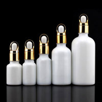 Flacon compte-gouttes en verre céramique blanc de luxe 5ml 10ml 15ml 20ml 30ml 50ml 100ml avec bouchon doré