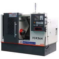 Tour CNC de haute précision TCK46A à banc incliné pour le traitement des métaux de moyenne intensité