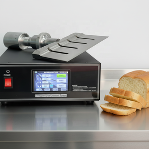 เครื่องตัดอัลตร้าโซนิค220โวลต์20กิโลเฮิรตซ์2000วัตต์ผลิตภาพ<span class=keywords><strong>ส</strong></span>ูง<span class=keywords><strong>ส</strong></span>ำหรับเ<span class=keywords><strong>ค</strong></span>้กอาหารส่วนประกอบใบมีดผสมไทเทเนียม - Product Image 1