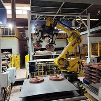 Bras de robot de palettisation et de manutention FANUC R-2000iC/210F 165F pour disques de frein et moyeux de roue, destiné aux lignes de production automobile