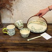 Handgemaakte keramische fruitmand met bloemenpatroon, multifunctioneel decoratief mandje met houten handvat voor buiten dineren