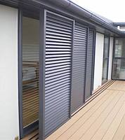 Système de volets coulissants à lames en aluminium mobiles avec décoration intérieure pour atelier et ferme, surface finie