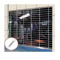 Volet roulant motorisé de conception moderne en gros, performance stable, grille en acier inoxydable et aluminium pour porte de magasin, antivol